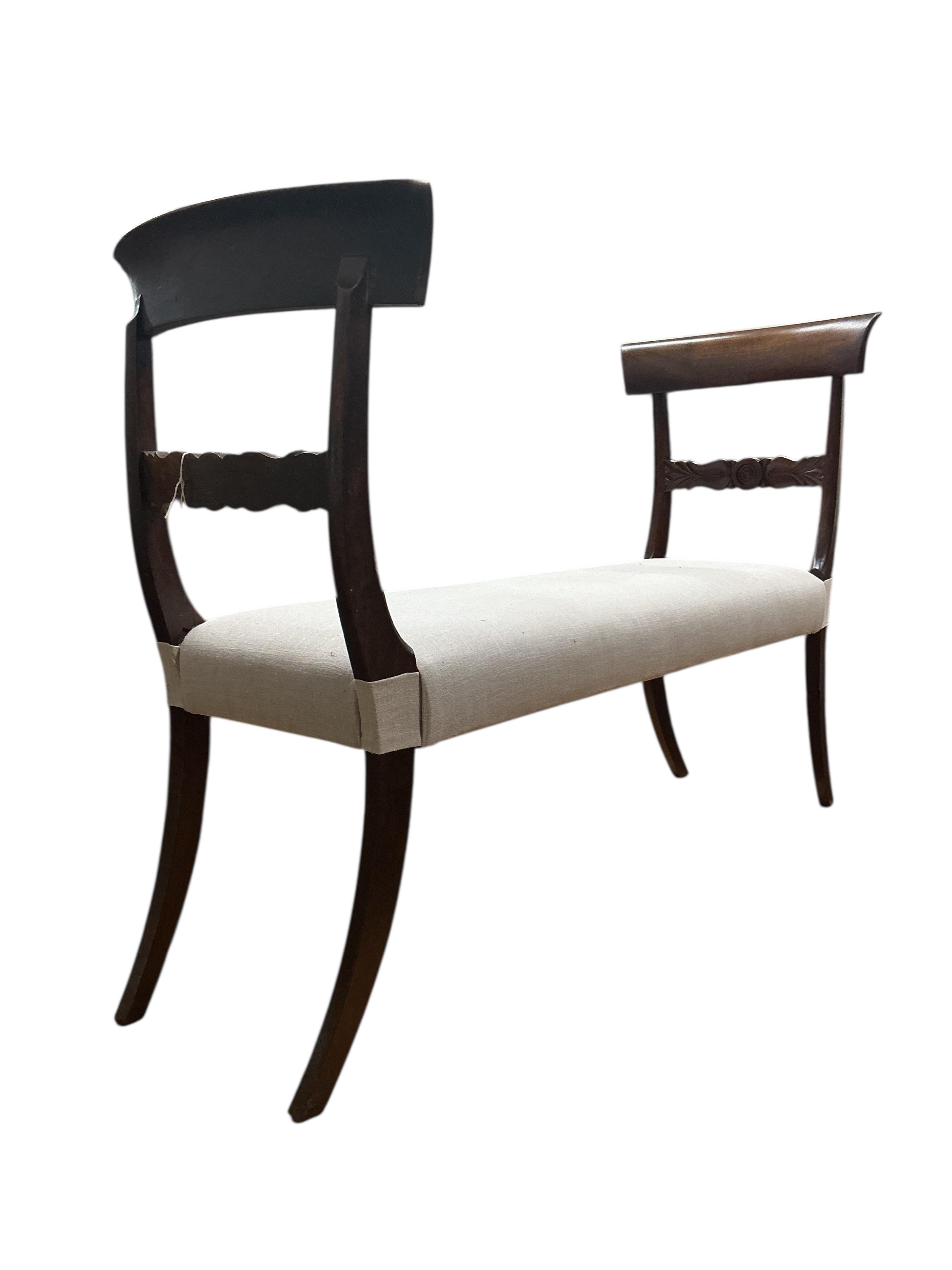 A Regency style upholstered mahogany window seat, adapted incorporating old timber, width 120cm, depth 38cm, height 88cm